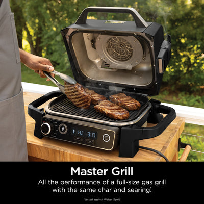 Ninja | Woodfire Series | 7-in-1 (Grill, BBQ, Roast, Air Fry, Dehydrate, Broil, Smoke) | Portable & Weather Resistant | Cook Up To 6 Steaks & 30 Hot Dogs | Woodfire Pellets included | OG701